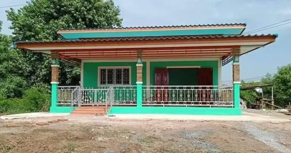 Stylish Green House Features Lovely Porch, 2 Bedrooms